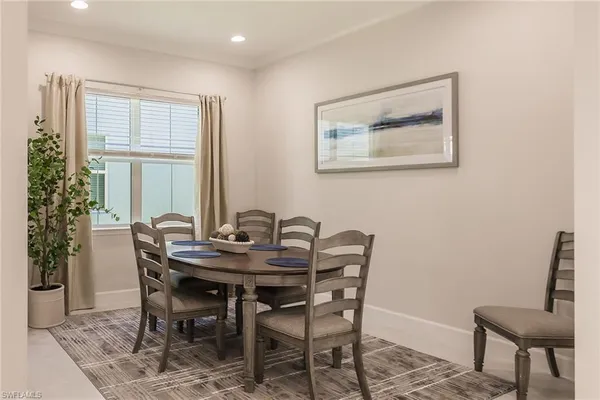 a view of a dining room with furniture