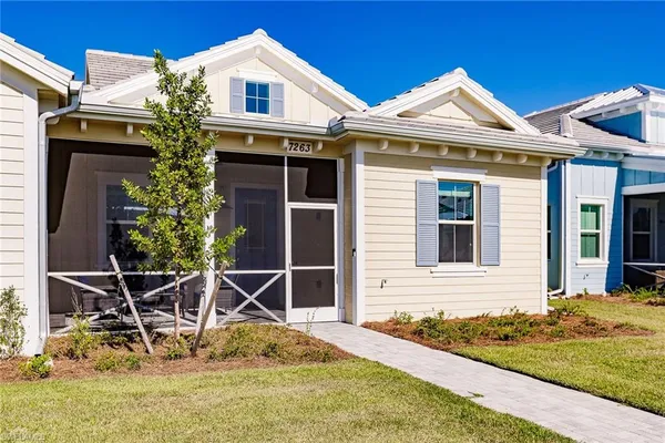 front view of a house with a yard