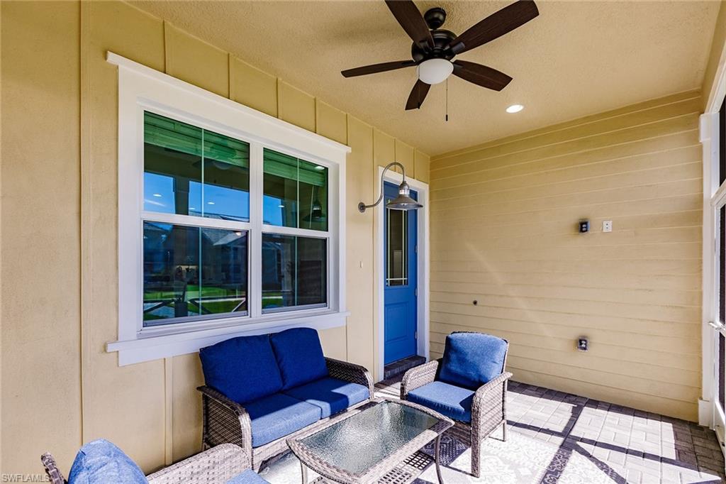7263 Cayo Coco Lane Naples, FL 34113 - Photo 6 of 44 a living room with furniture and a window