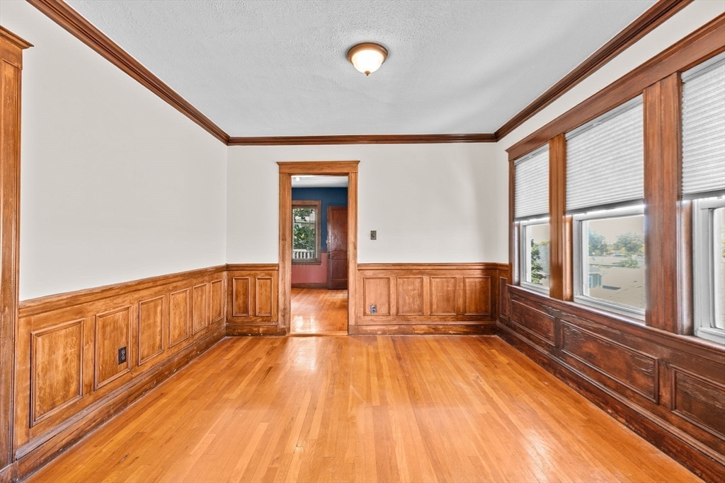 25 Whitby Terrace, Unit 3 Boston, MA 02125 - Photo 11 of 35 a view of hallway with wooden floor
