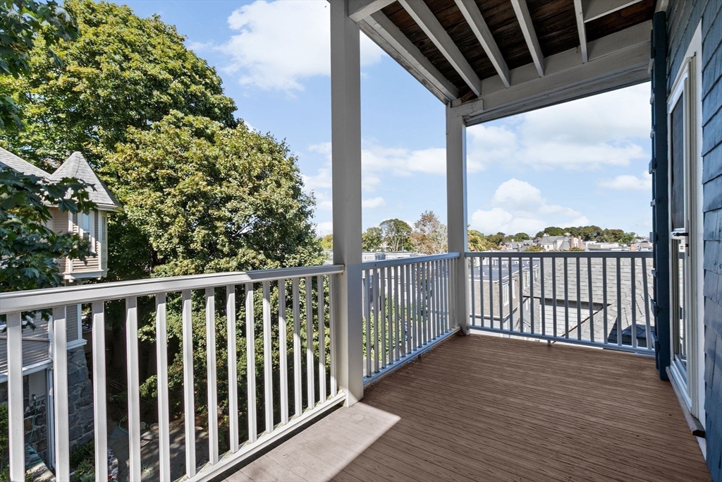 25 Whitby Terrace, Unit 3 Boston, MA 02125 - Photo 17 of 35 a view of a balcony with wooden floor