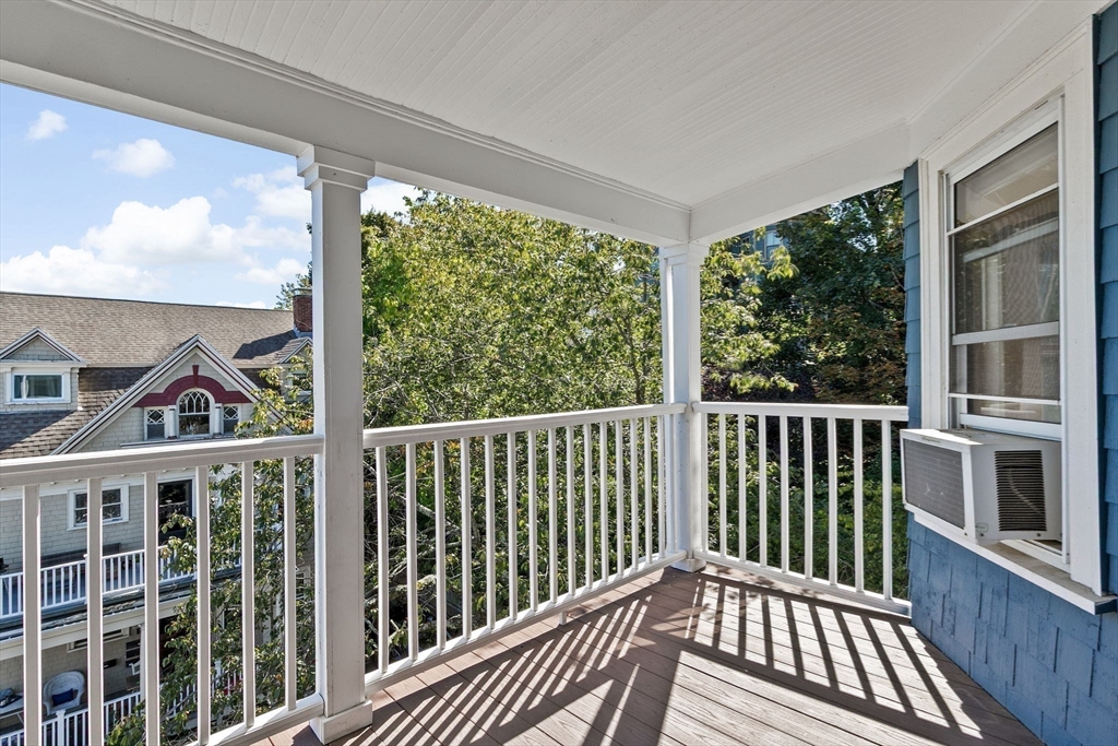 25 Whitby Terrace, Unit 3 Boston, MA 02125 - Photo 28 of 35 a view of a balcony with wooden floor