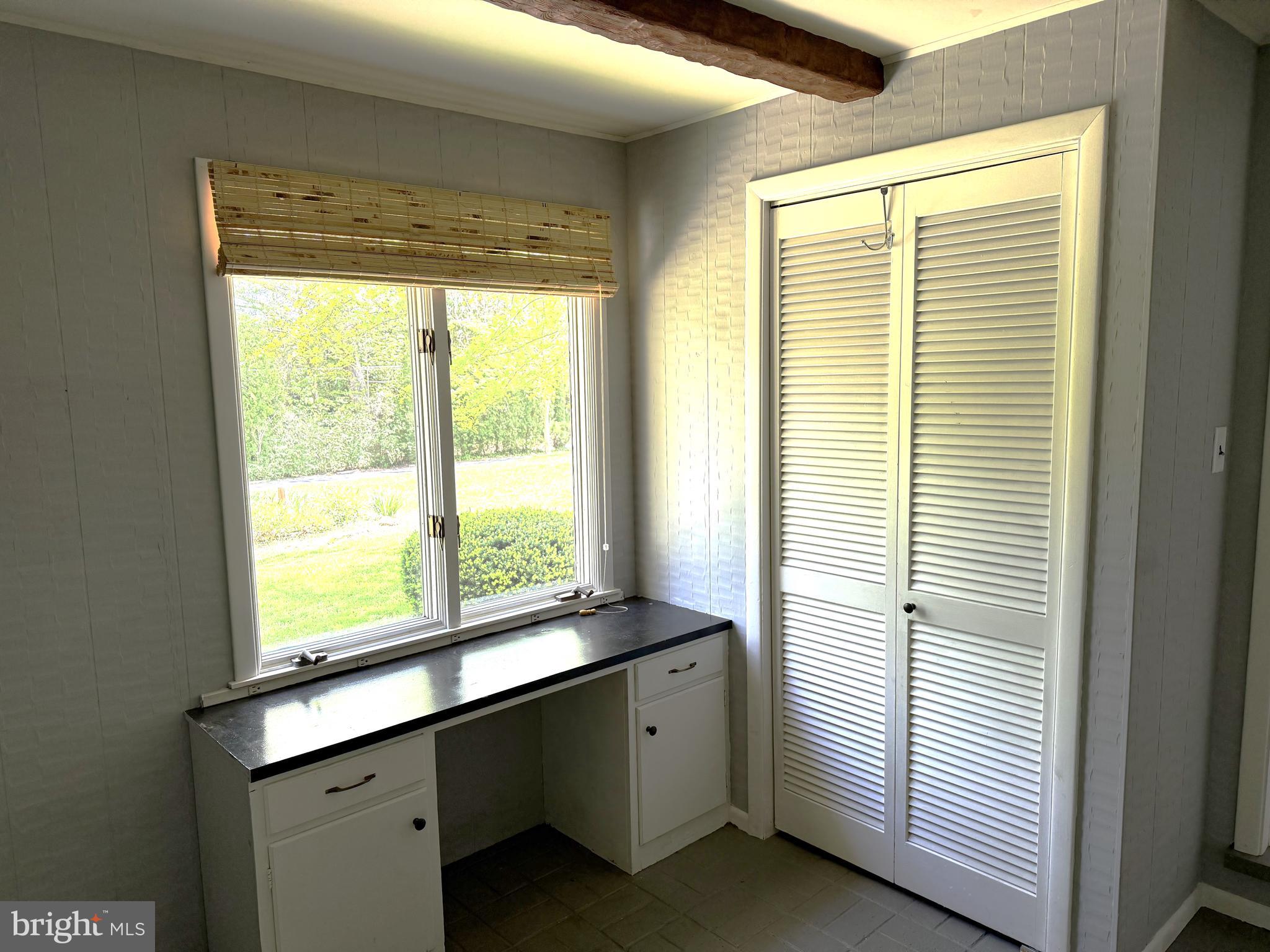 116 Beebe Run Road Bridgeton, NJ 08302 - Photo 22 of 24 a kitchen with a large window sink and cabinets