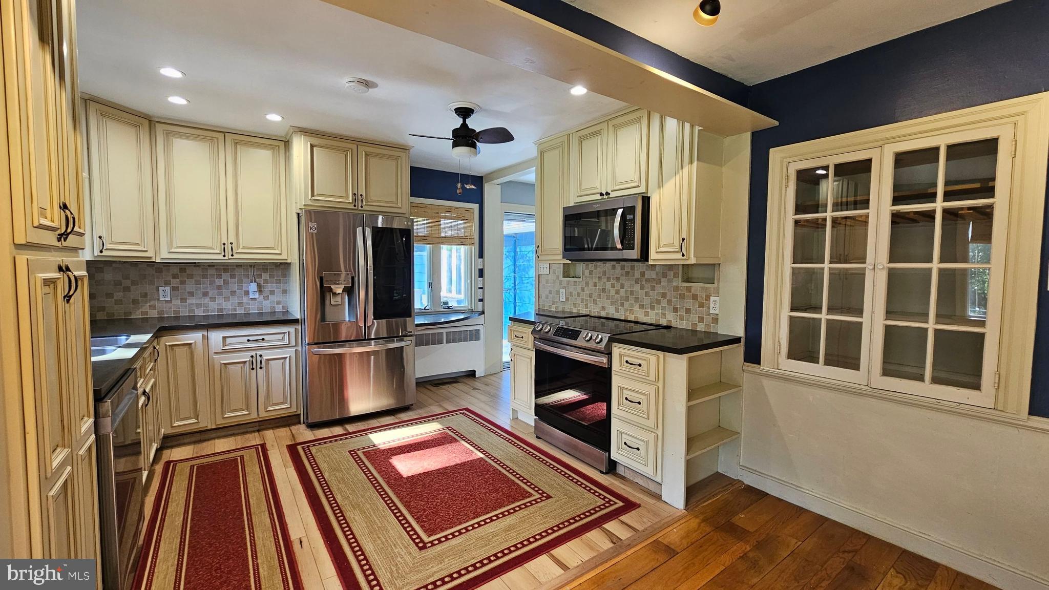 116 Beebe Run Road Bridgeton, NJ 08302 - Photo 5 of 24 a kitchen with stainless steel appliances granite countertop a stove and a sink