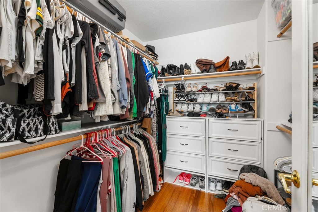 26 Richemont Way Aliso Viejo, CA 92656 - Photo 25 of 33 a view of walk in closet with clothes and shoes