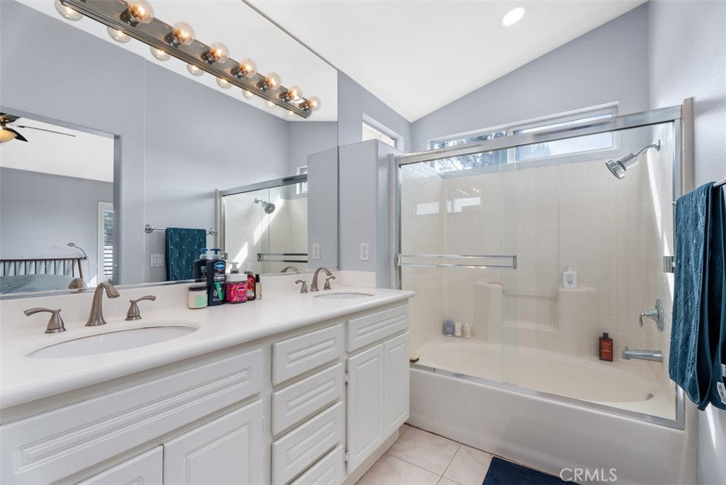 26 Richemont Way Aliso Viejo, CA 92656 - Photo 26 of 33 a bathroom with a tub sink and mirror