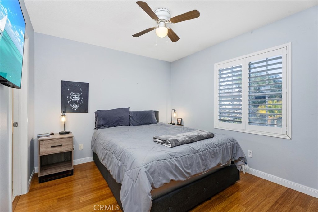 26 Richemont Way Aliso Viejo, CA 92656 - Photo 27 of 33 a bedroom with a bed and a window