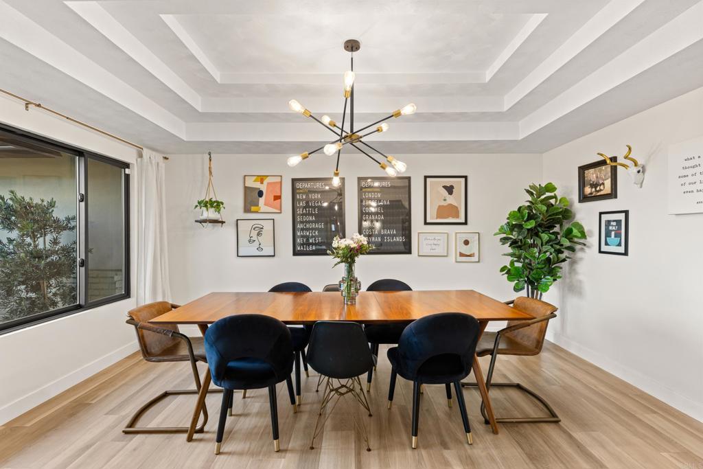 1637 Kings Way Vista, CA 92084 - Photo 14 of 39 a dining room with furniture and window