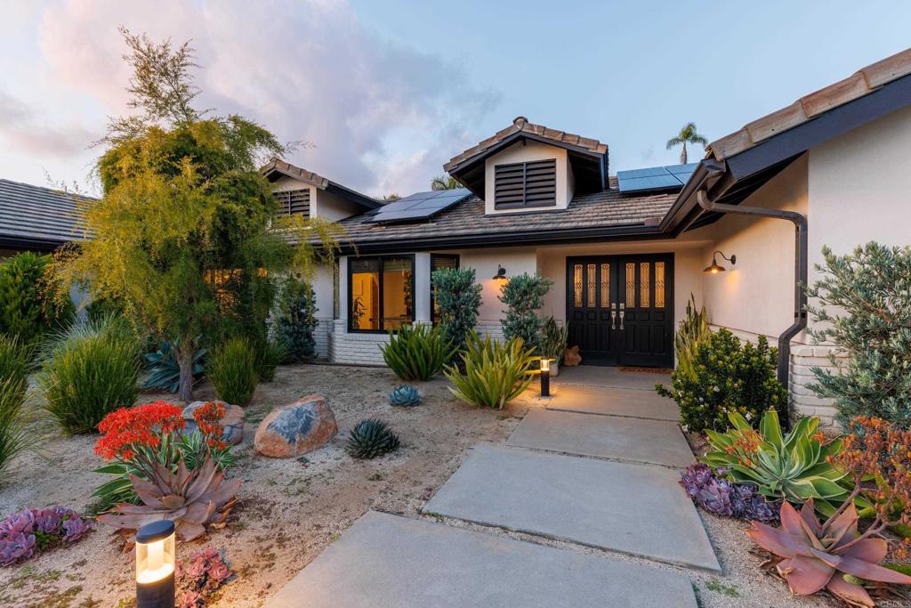 1637 Kings Way Vista, CA 92084 - Photo 2 of 39 a front view of a house with a yard