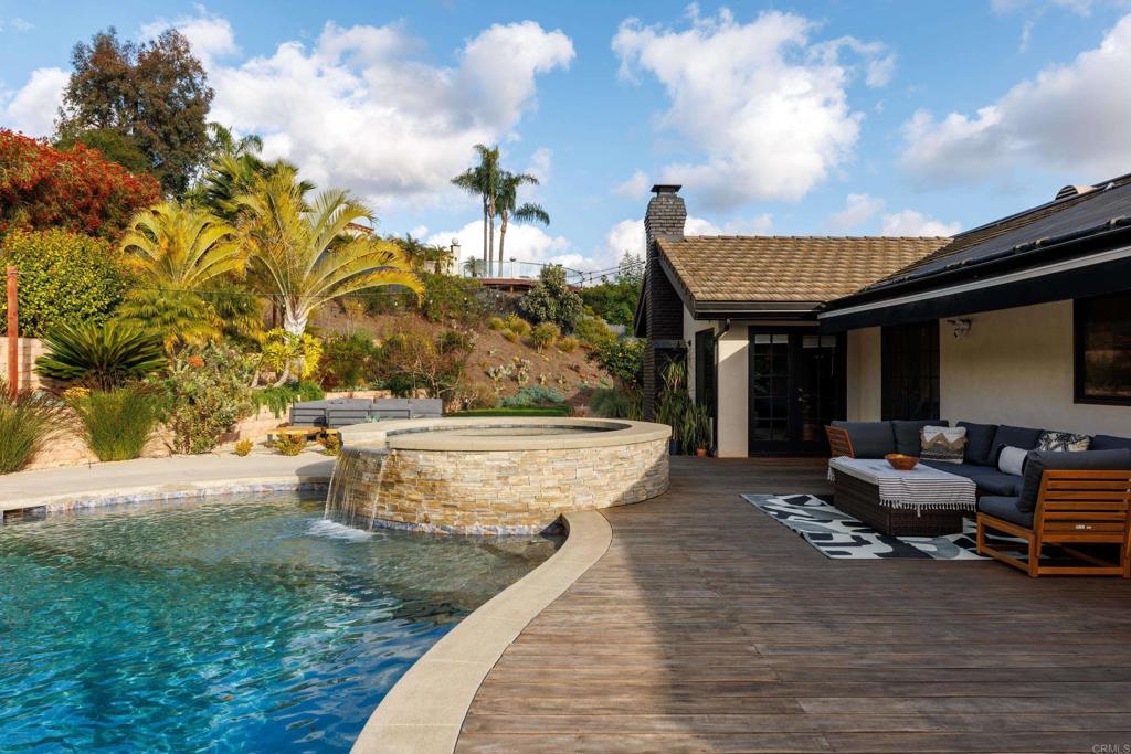 1637 Kings Way Vista, CA 92084 - Photo 26 of 39 a view of a house with backyard porch and sitting area
