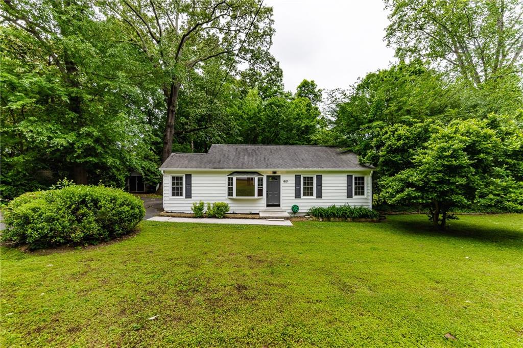 601 Scott Circle Decatur, GA 30033 - Photo 1 of 1 a view of a house with a garden
