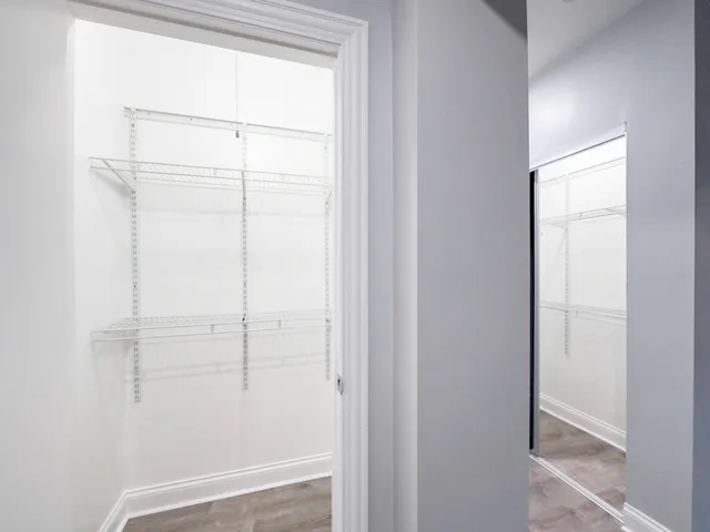 a bathroom with a glass shower door