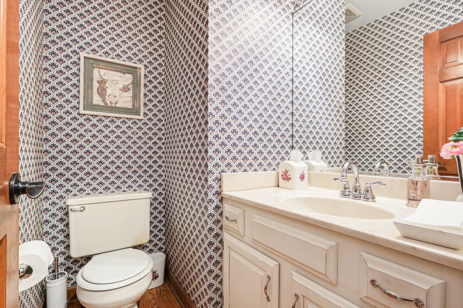 570 Violet Lane Batavia, IL 60510 - Photo 7 of 28 a bathroom with a granite countertop toilet and a sink
