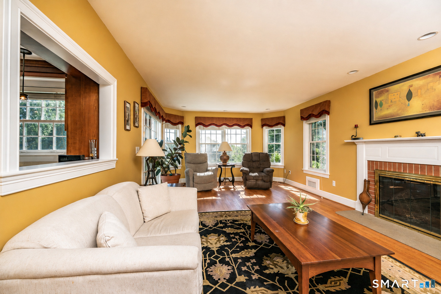 35 Anderson Lane Durham, CT 06422 - Photo 8 of 25 Spacious family room with fireplace, hardwood floors, and a convenient pass-through to the gourmet kitchen