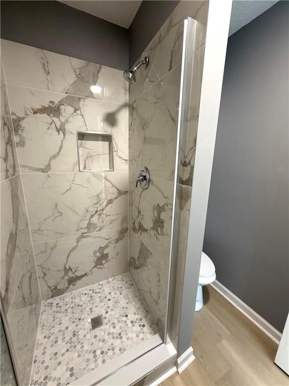 2205 Springer Walk Lawrenceville, GA 30043 - Photo 17 of 26 a bathroom with a shower