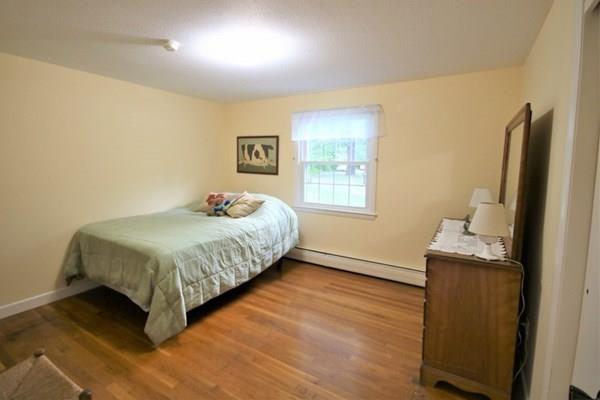 140 Old County Road Lancaster, MA 01523 - Photo 16 of 39 a bedroom with a bed and a window