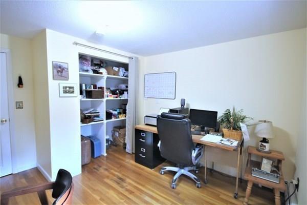 140 Old County Road Lancaster, MA 01523 - Photo 18 of 39 a view of a workspace with furniture and wooden floor
