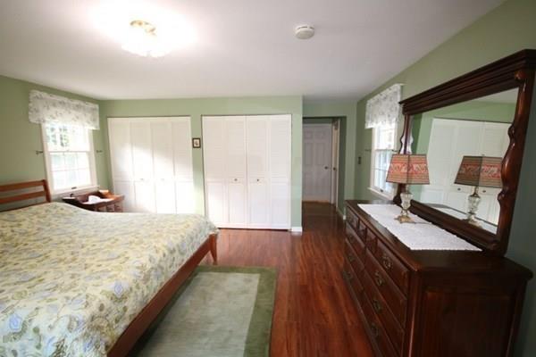 140 Old County Road Lancaster, MA 01523 - Photo 24 of 39 a bedroom with a bed and a dresser