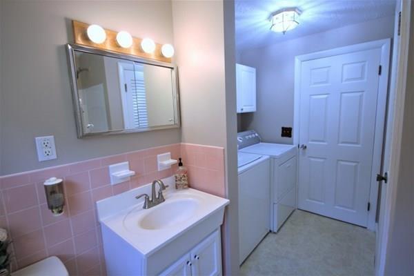 140 Old County Road Lancaster, MA 01523 - Photo 26 of 39 a bathroom with a sink and a mirror