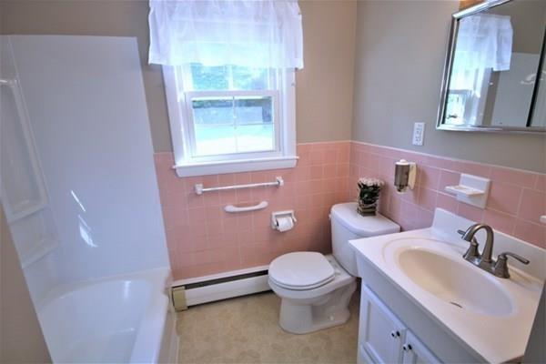 140 Old County Road Lancaster, MA 01523 - Photo 27 of 39 a white toilet sitting next to a bathroom sink