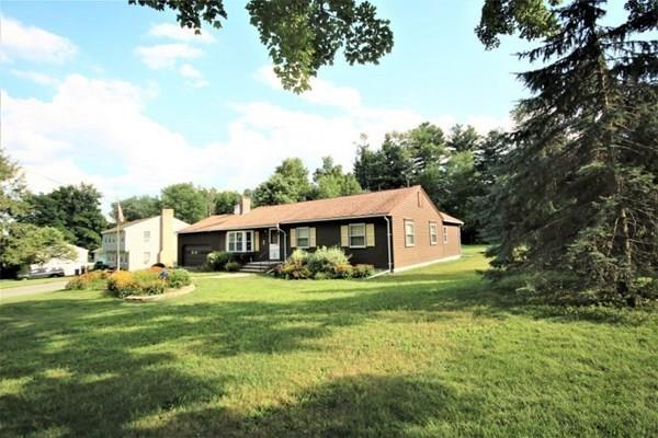 140 Old County Road Lancaster, MA 01523 - Photo 28 of 39 a front view of house with yard and green space