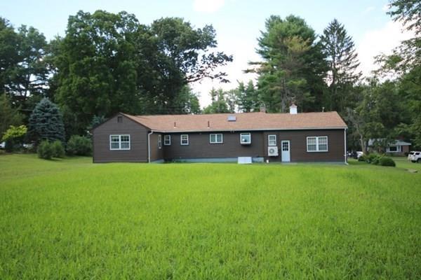 140 Old County Road Lancaster, MA 01523 - Photo 34 of 39 a view of a house with a yard