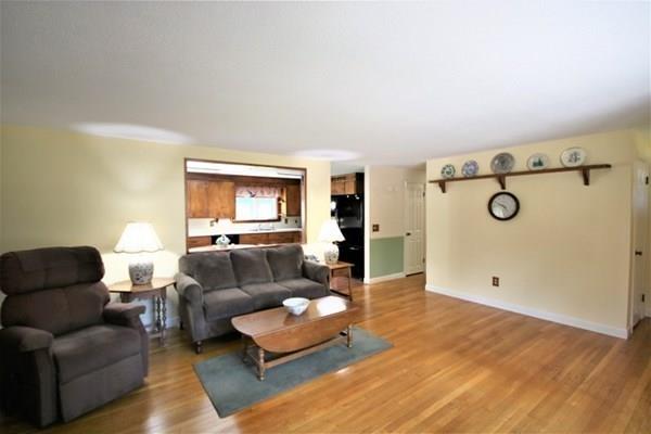 140 Old County Road Lancaster, MA 01523 - Photo 6 of 39 a living room with furniture and a window