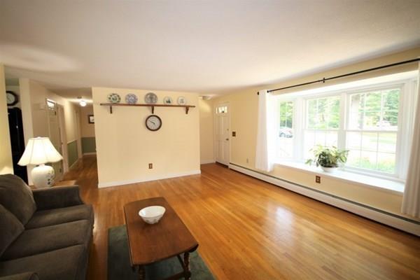 140 Old County Road Lancaster, MA 01523 - Photo 7 of 39 a living room with furniture and a large window
