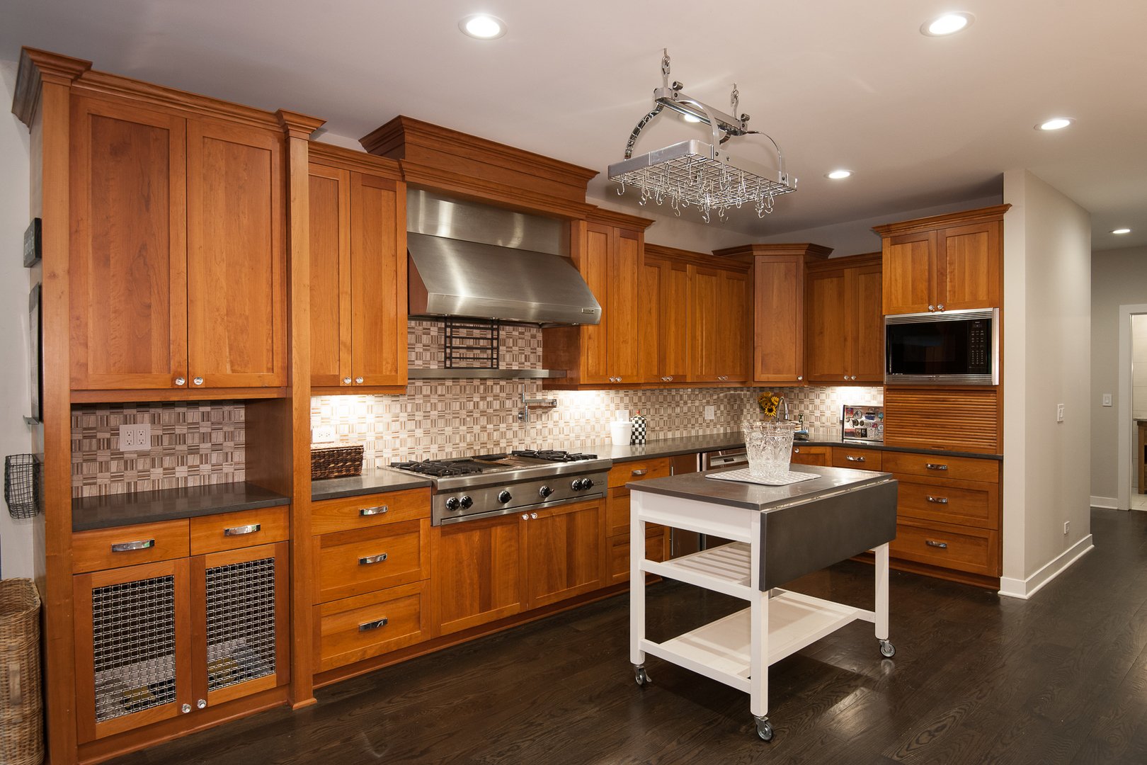 Undisclosed Address Riverwoods, IL 60015 - Photo 12 of 33 a kitchen with stainless steel appliances granite countertop a sink wooden cabinets and a granite counter tops