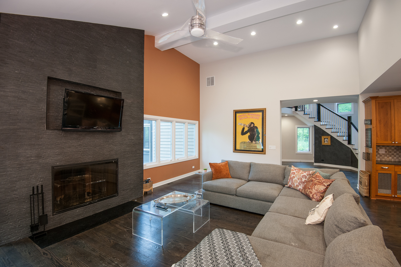 Undisclosed Address Riverwoods, IL 60015 - Photo 13 of 33 a living room with furniture a flat screen tv and a fireplace