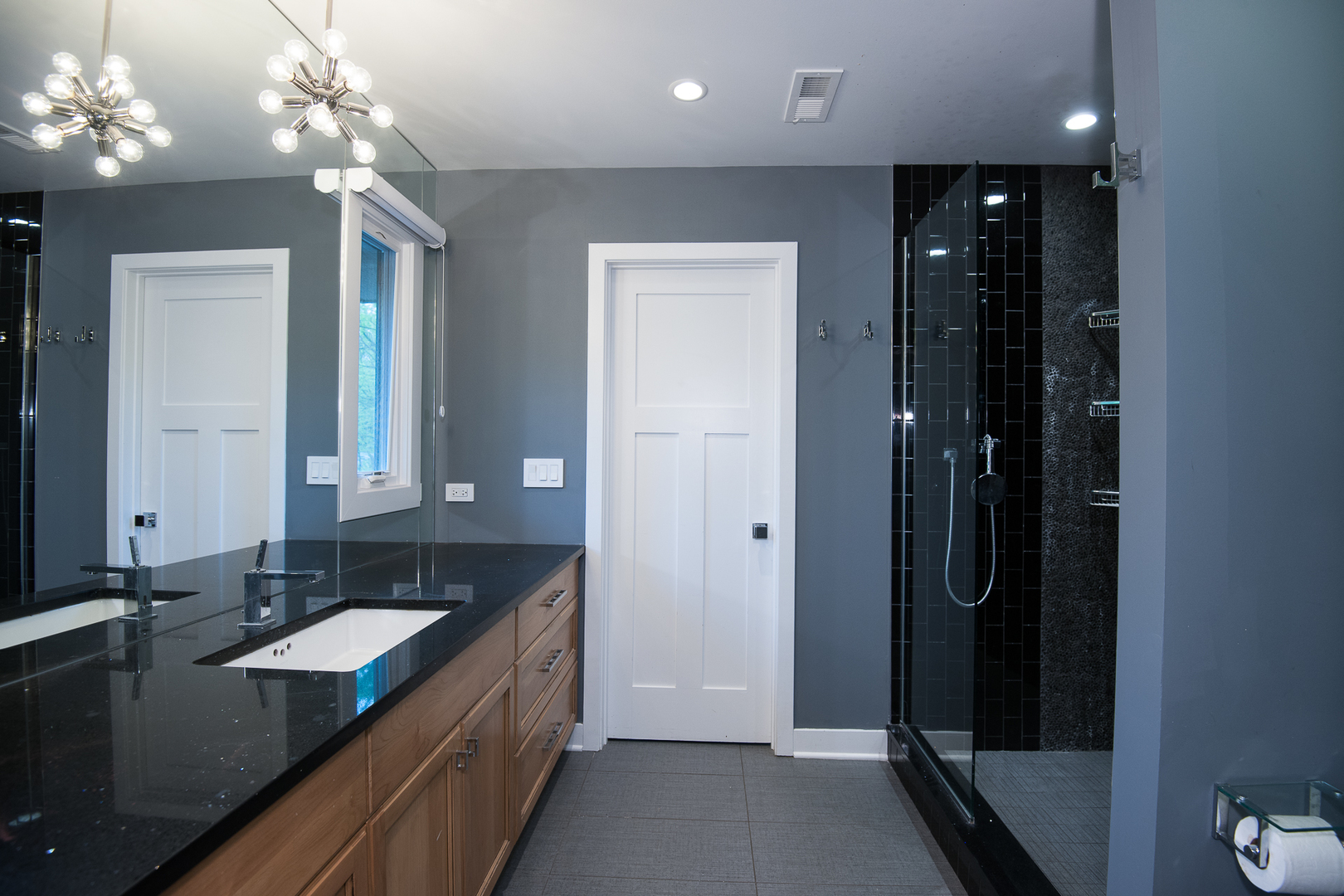 Undisclosed Address Riverwoods, IL 60015 - Photo 25 of 33 a spacious bathroom with a granite countertop sink a light fixture and a mirror