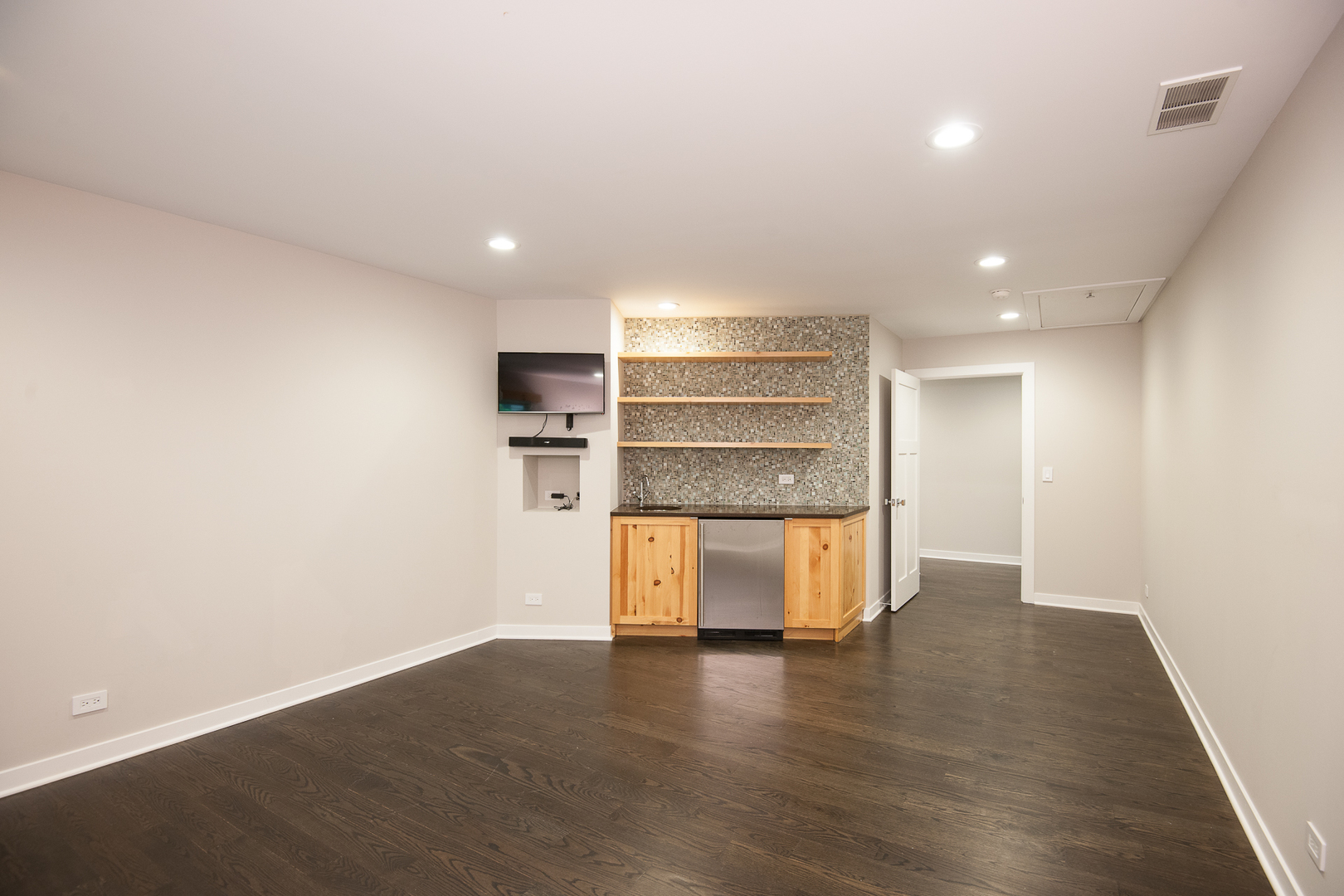 Undisclosed Address Riverwoods, IL 60015 - Photo 26 of 33 a view of a kitchen with a sink and a refrigerator