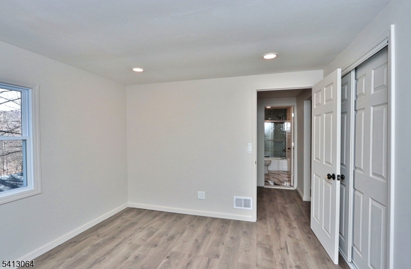 75 Nolans Point Road Lake Hopatcong, NJ 07849 - Photo 25 of 48 wooden floor in an empty room with a window