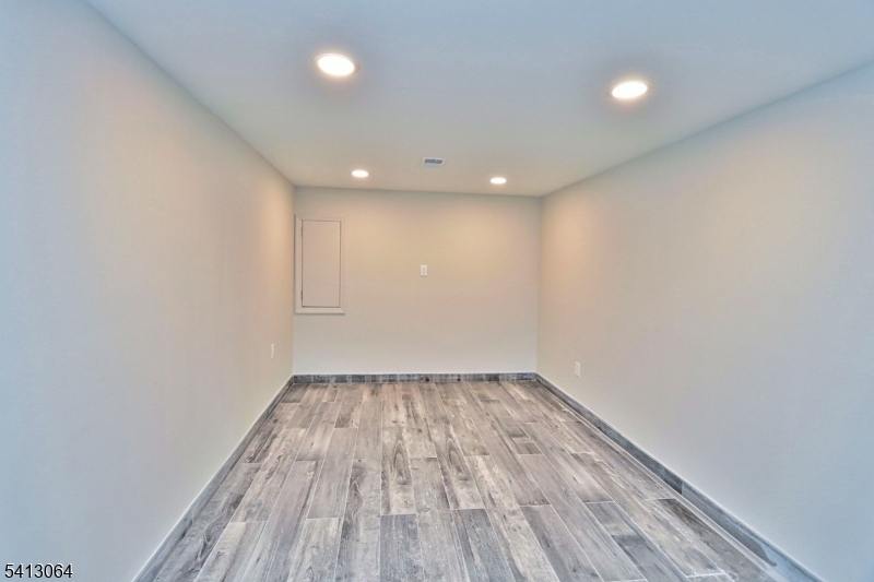 75 Nolans Point Road Lake Hopatcong, NJ 07849 - Photo 37 of 48 a view of wooden floor and chandelier in a room
