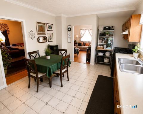 61 Bartlett Street Meriden, CT 06451 - Photo 10 of 30 a view of a dining room with furniture