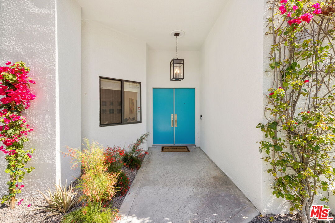 1414 Sagebrush Road Palm Springs, CA 92264 - Photo 9 of 48 a front view of a house