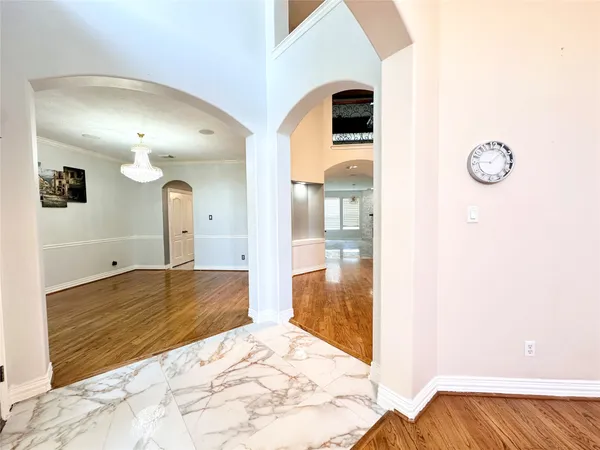 a view of a bedroom from a hallway