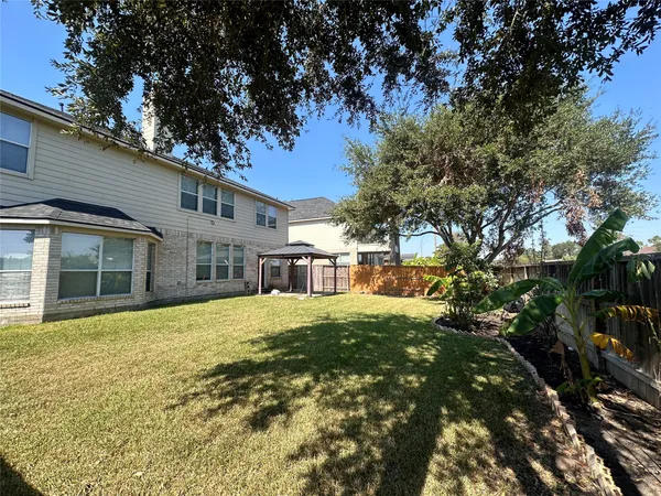 a front view of a house with swimming pool