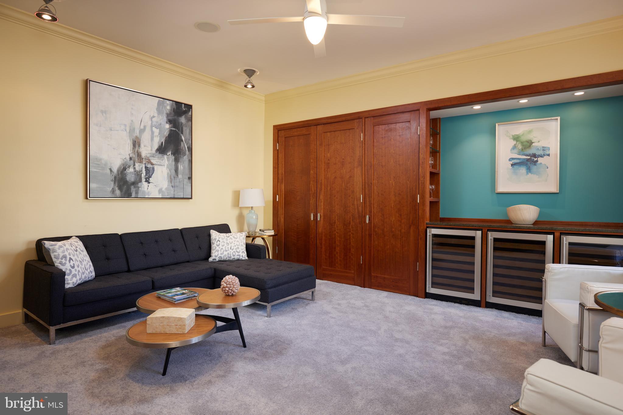 2230 California Street Northwest, Unit 6AE Washington, DC 20008 - Photo 20 of 45 a living room with furniture and a window