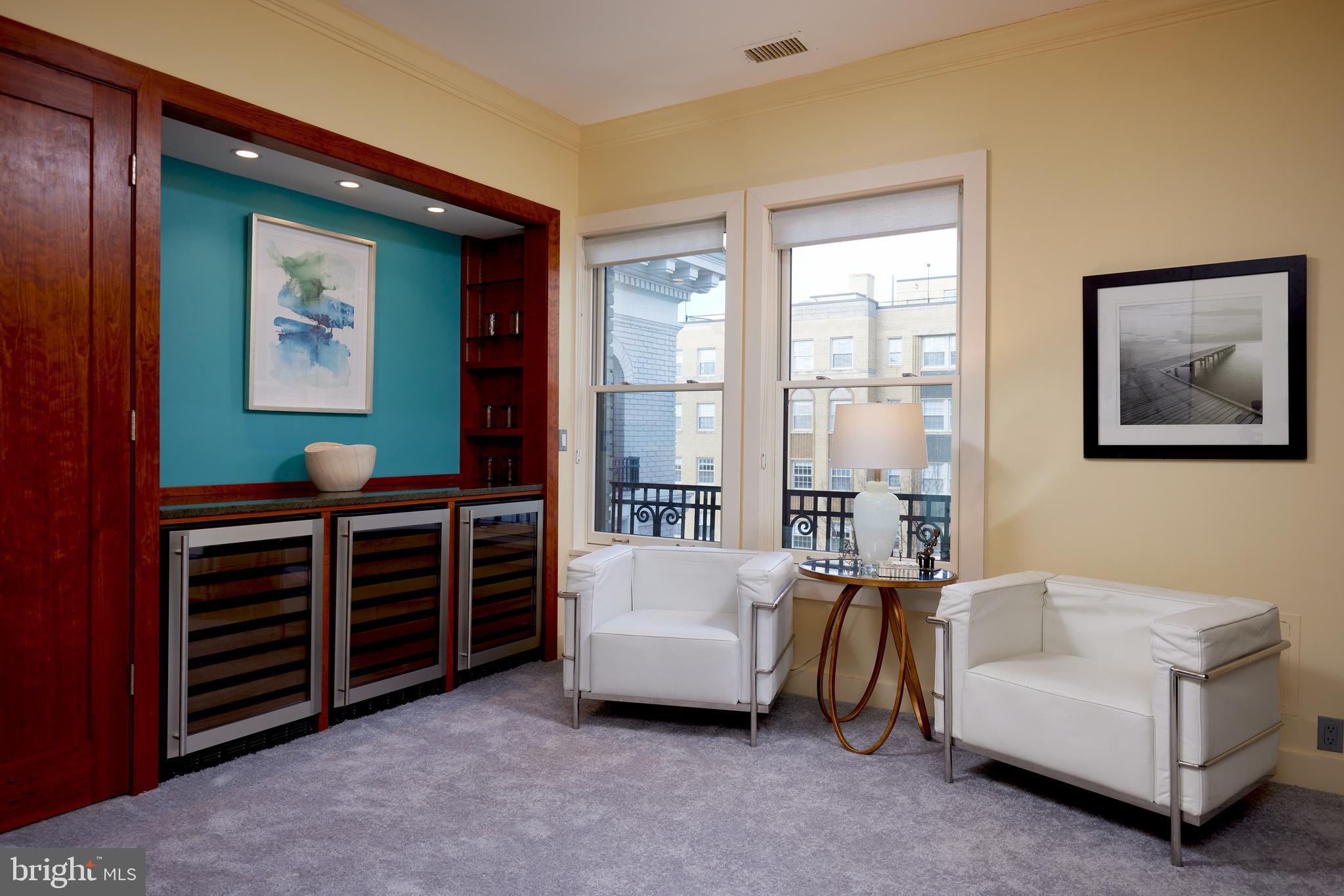 2230 California Street Northwest, Unit 6AE Washington, DC 20008 - Photo 22 of 45 a living room with furniture and a window