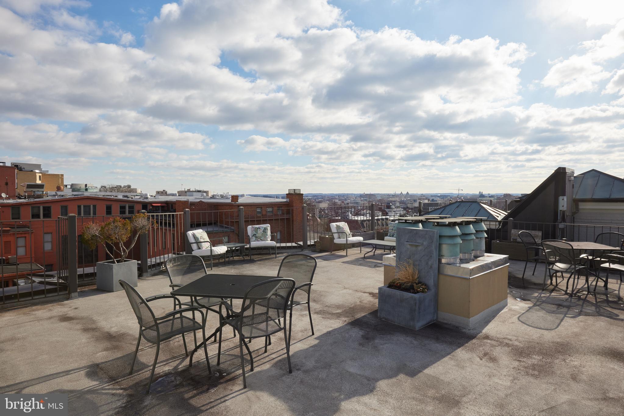 2230 California Street Northwest, Unit 6AE Washington, DC 20008 - Photo 29 of 45 a view of a terrace with furniture