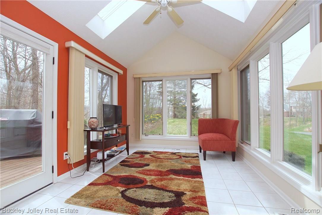 9490 Quail Ridge Run Brighton, MI 48114 - Photo 4 of 27 Cozy 4 Season Room.JPG
