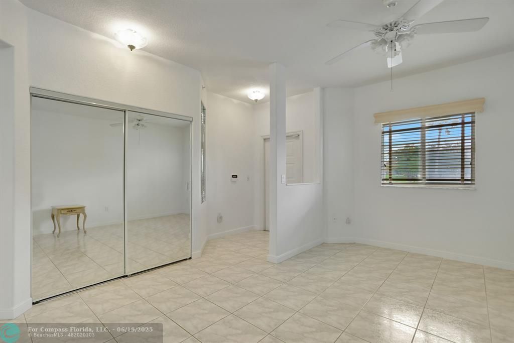 7727 Southampton Terrace, Unit 205 Tamarac, FL 33321 - Photo 15 of 36 a view of an empty room with a window