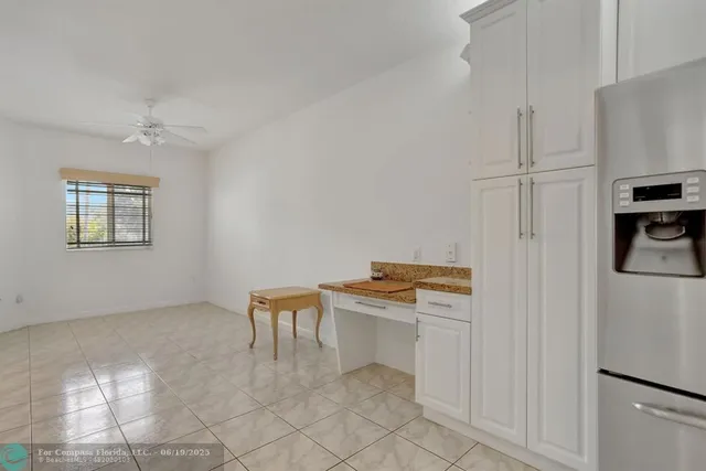 a room with furniture a washer and dryer