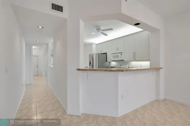 a view of a chandelier in a room