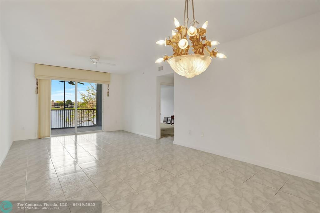7727 Southampton Terrace, Unit 205 Tamarac, FL 33321 - Photo 21 of 36 a view of an empty room with a window