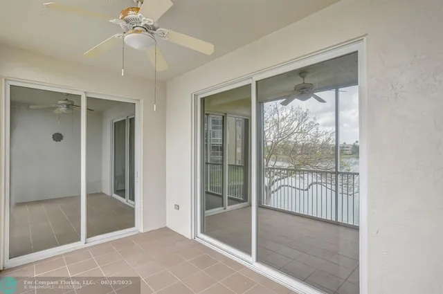 an empty room with closet and cabinet