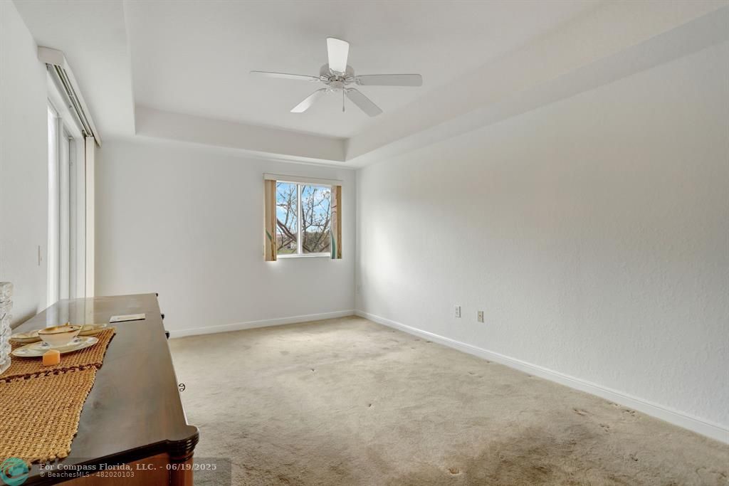 7727 Southampton Terrace, Unit 205 Tamarac, FL 33321 - Photo 30 of 36 an empty room with windows