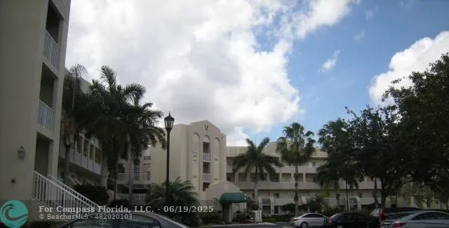 a front view of building with street
