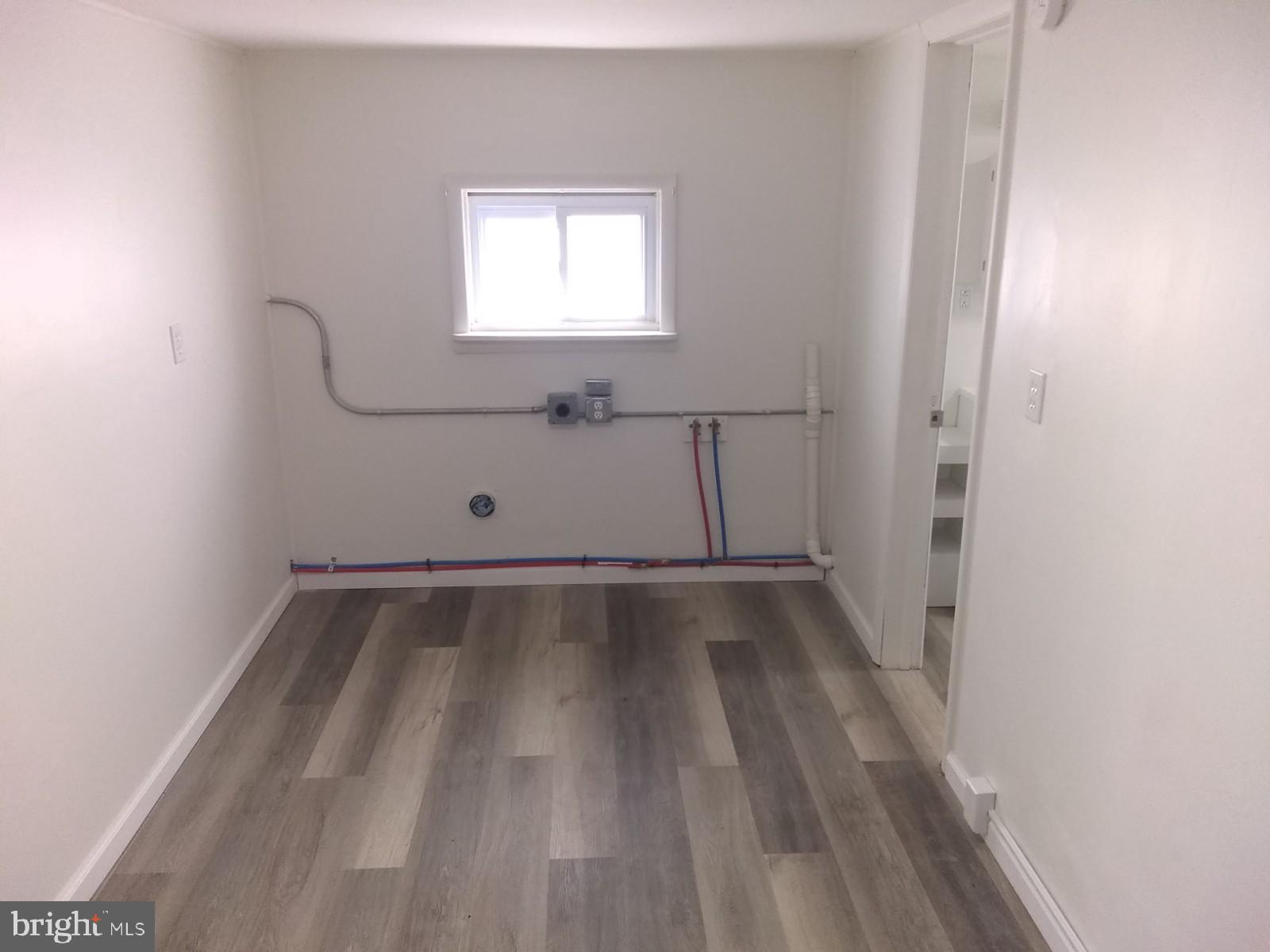 623 Miller Road Delta, PA 17314 - Photo 7 of 7 a view of a room with wooden floor and window